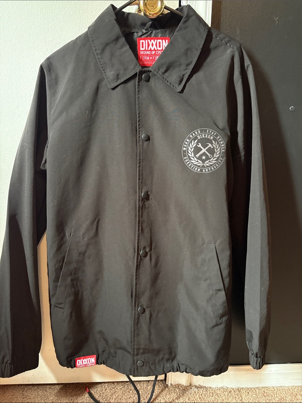 DIXXON Black Coach Windbreaker Jacket with Chest Emblem